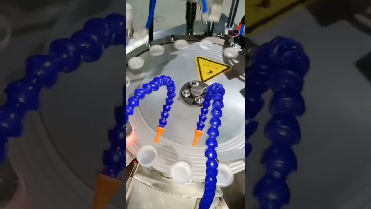 Rotary dual head cap wad foil liner inserting wadding lining machine