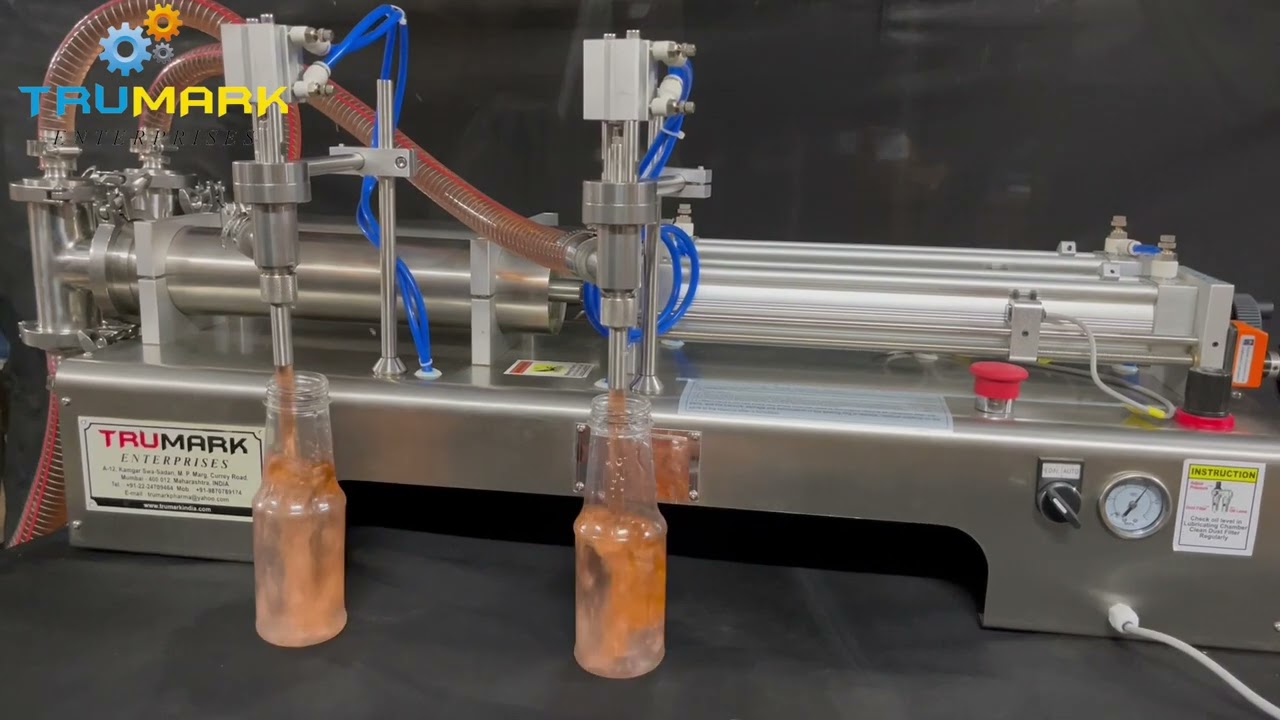 bench top liquid filler - 2 nozzle pneumatic machine