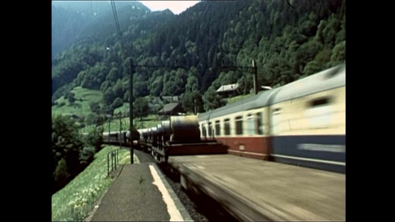 14. Juli 1984: Züge am Gotthard mit bunten DB-, SBB-, FS-Wagen (Arth-Goldau, Intschi, Göschenen)