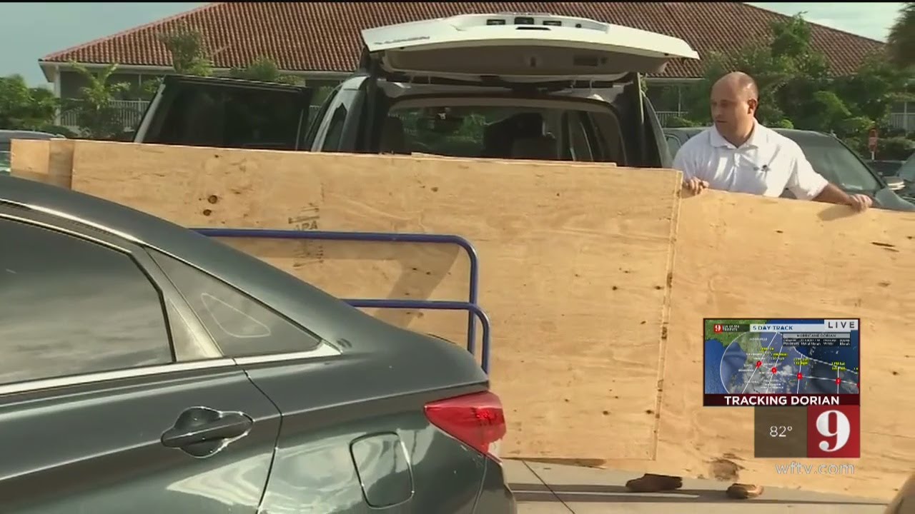 Video: Brevard County residents rush to secure homes as Hurricane Dorian nears