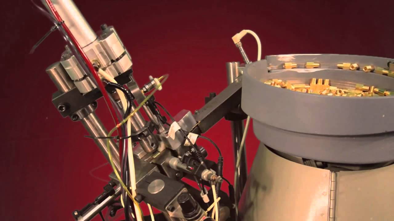 Clippard Instrument Laboratory Inc. Automated Pneumatic Stamping Machine