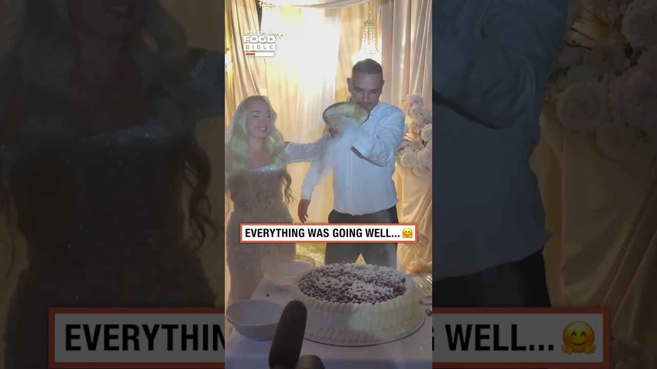 Groom pushes cake off the table 🎂😳💒                           🎥: Olya Chashuk via ViralHog