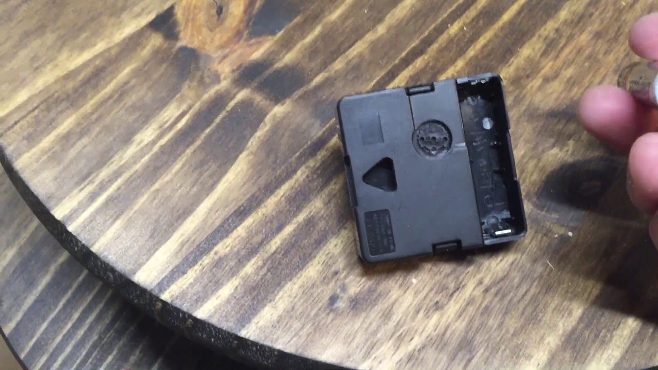 Battery installation clock motor