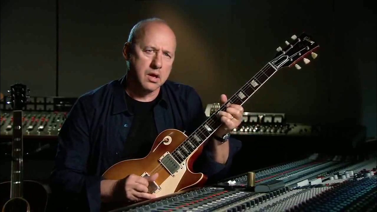 Mark Knopfler on guitar