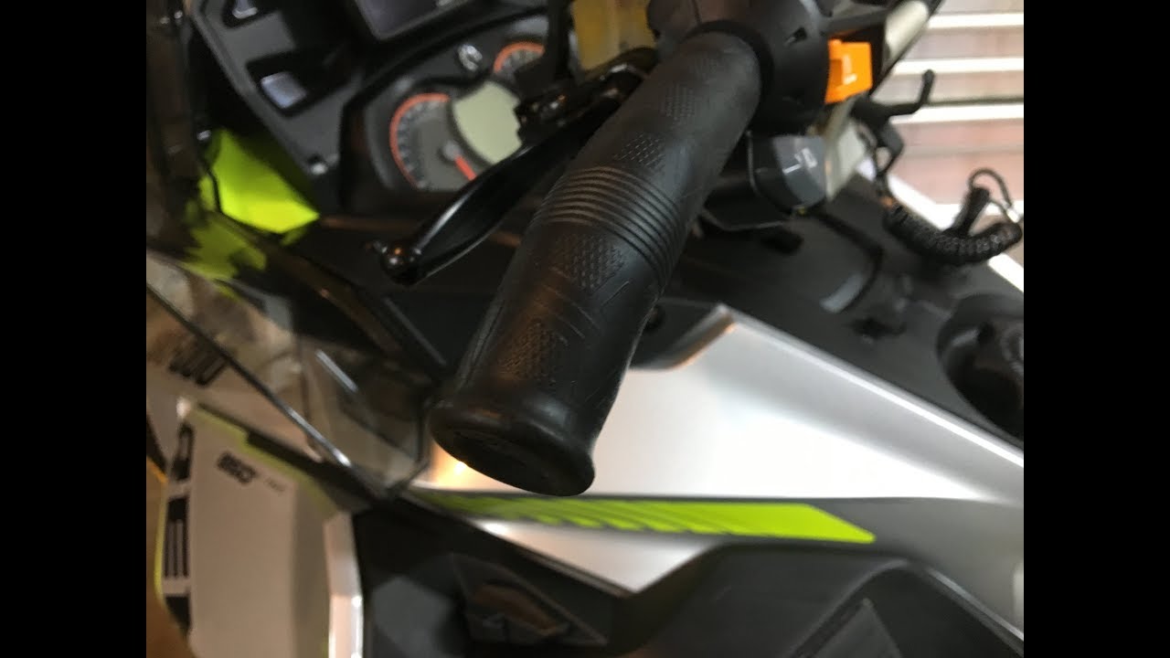 Remove and install BRP Ski-Doo snowmobile hand grips.