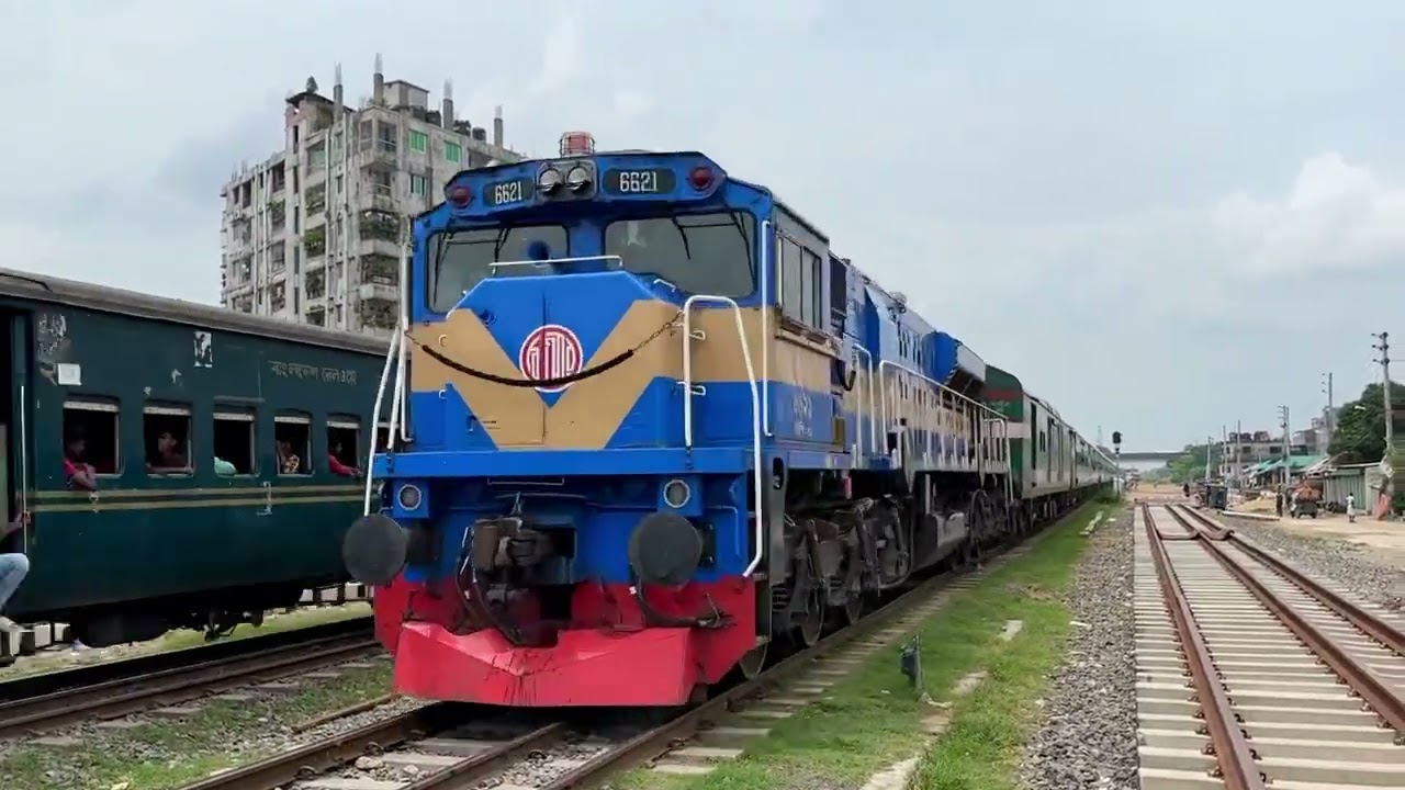 EMD 6621 opening notches and passes Tongi Junction with Silk City Express