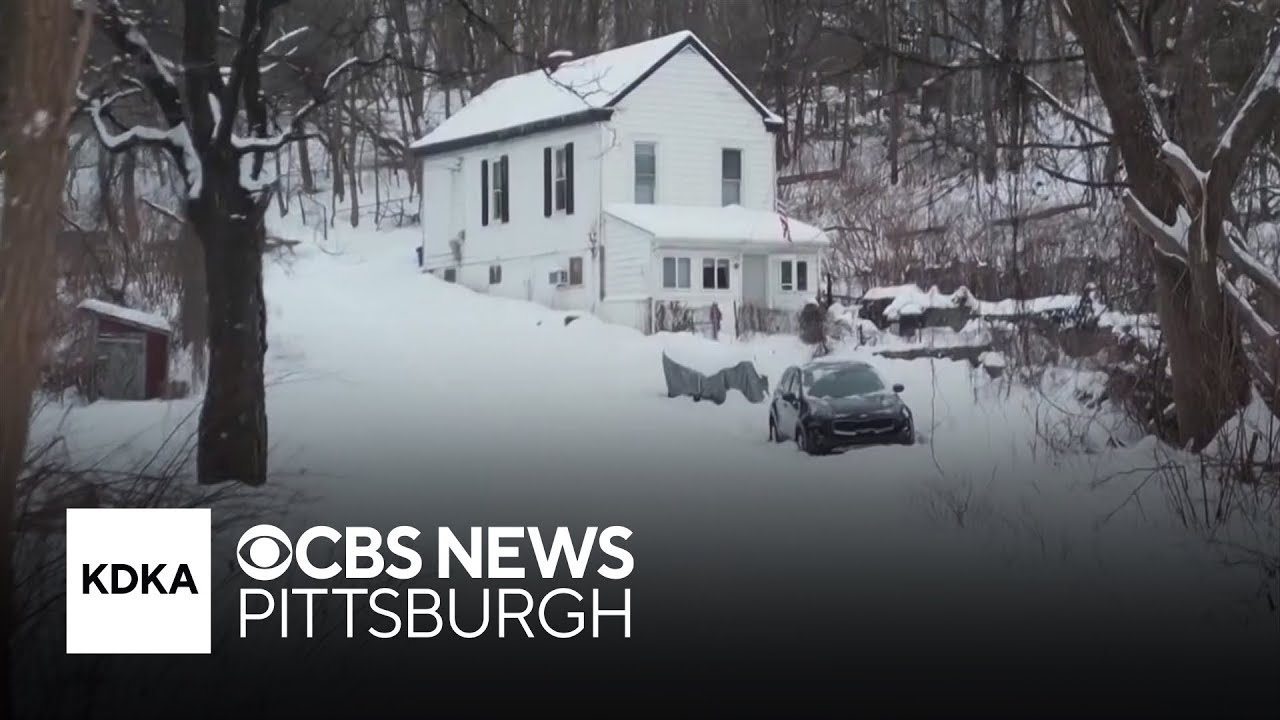 Days after storm, 12 inches of snow still covers street, leaving man stuck