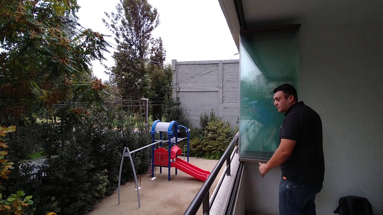 Cierre de balcones con ventanas plegables de vidrio templado