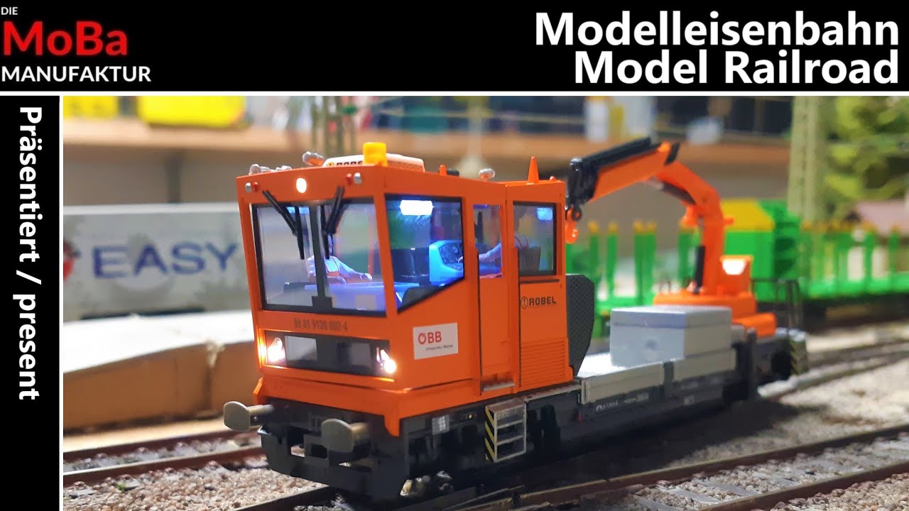 Modelleisenbahn H0 - PRÄSENTIERT Viessmann Gleiskraftwagen ÖBB Robel 54.22 Kran Funktion Roco Anlage