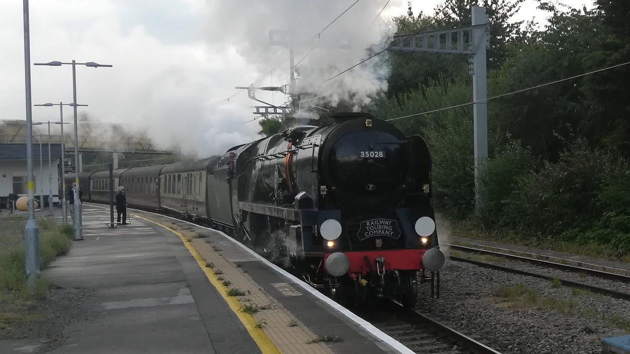 35028 Clan Line steaming through Swindon with The Cotswold Venturer on the 21st August 2021.