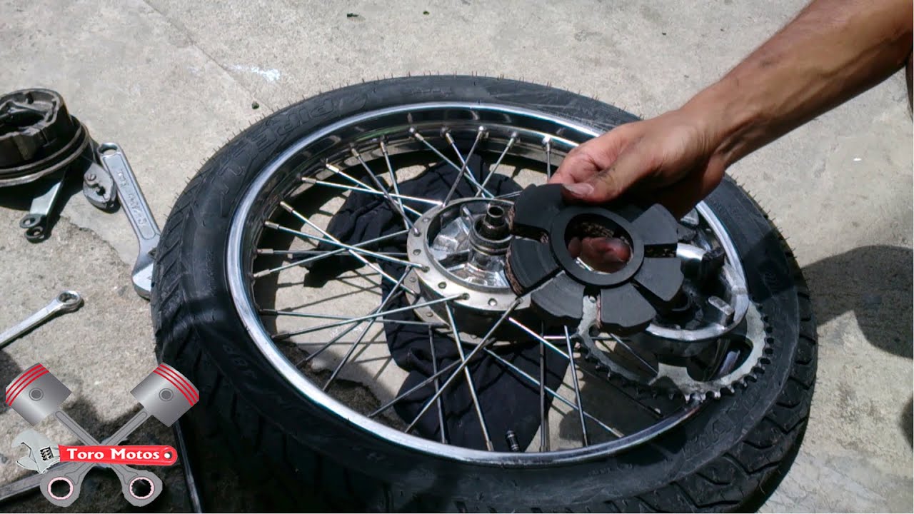 Suzuki Ax 100 Cambio De Cauchos Quitar Rueda Trasera | ToroMotos