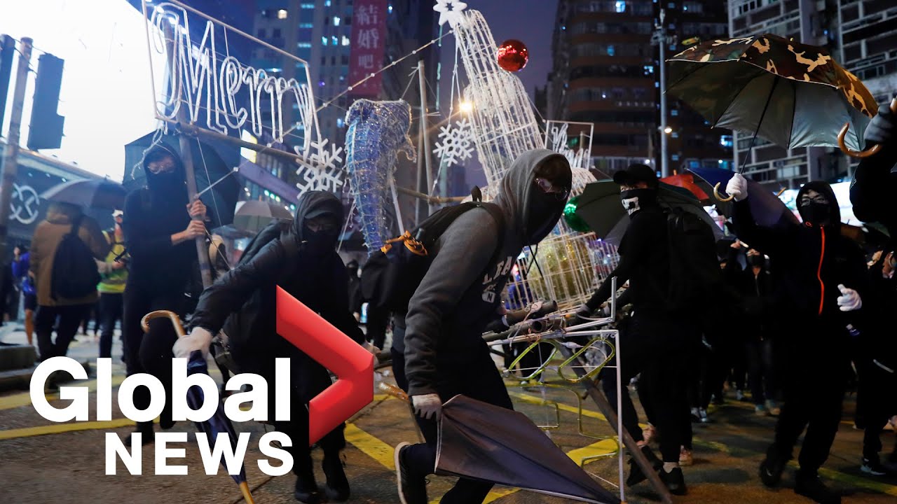 Hong Kong protesters block roads, clash with police on New Year's Eve