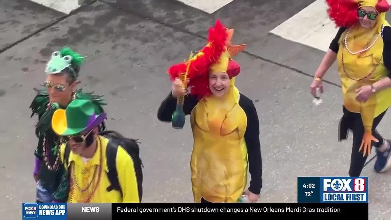 Mardi Gras revelers pack Bourbon Street in New Orleans' French Quarter