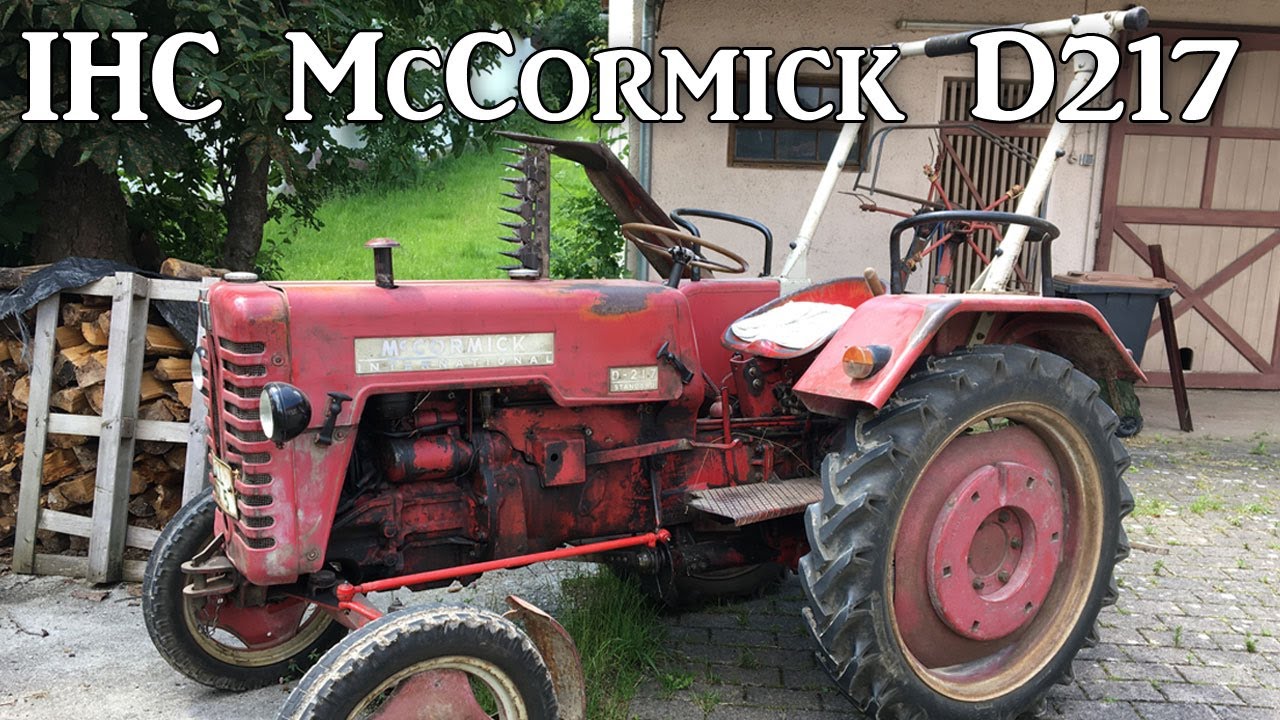 IHC Mc Cormick D217 Traktor beim Gras - Wiese mähen mit Balkenmäher
