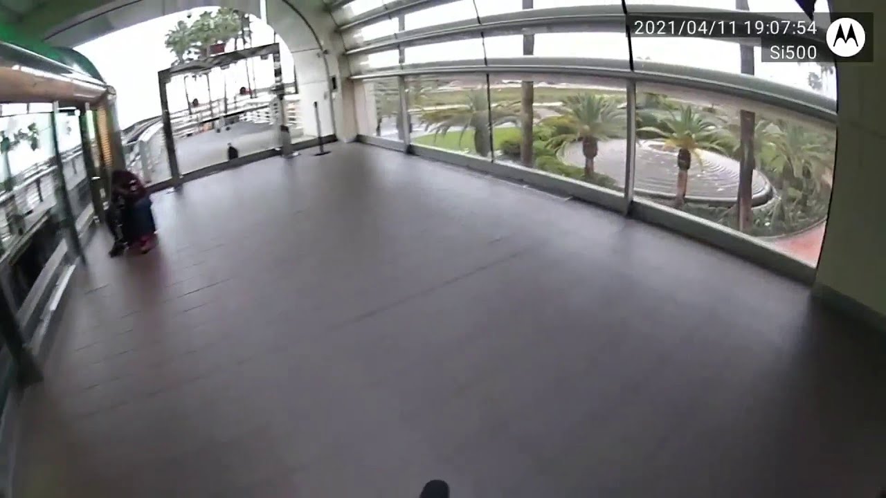 Police officer chases woman on motorized suitcase at Orlando airport