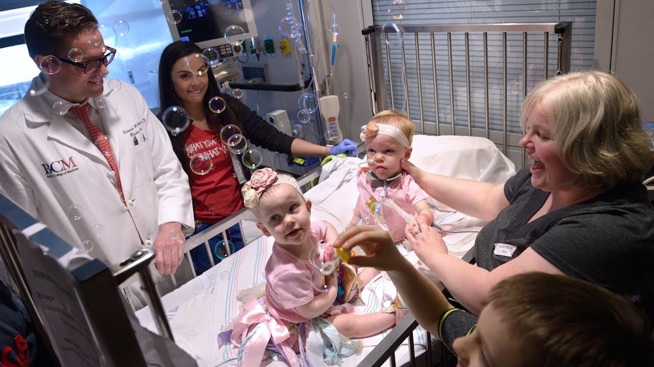 Formerly Conjoined Twin Reunites with Sister After 482 Days in Hospital