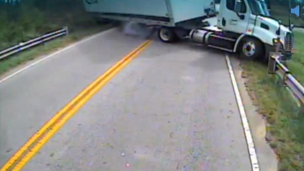 Driver Keeps Her Cool as Her School Bus Collides with Semitrailer