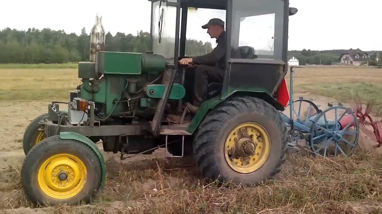 Ciągnik sam S-320 z kopaczką gwiazdową.