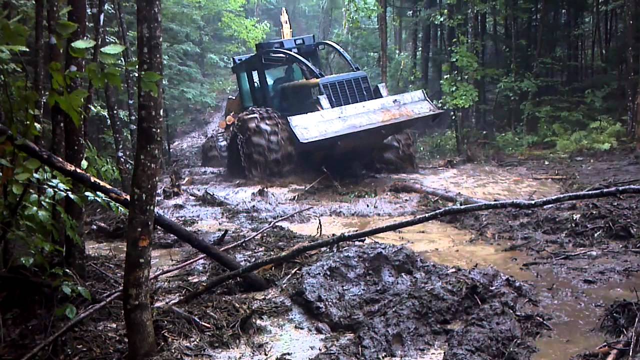 Logging in a little mud with a 525 cat grapple