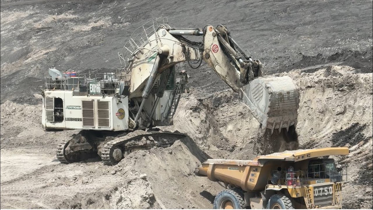 Epic Action Footage with a Liebherr R 9350 Excavator Loading a Cat 777 Dump Truck ~ Miningstory 