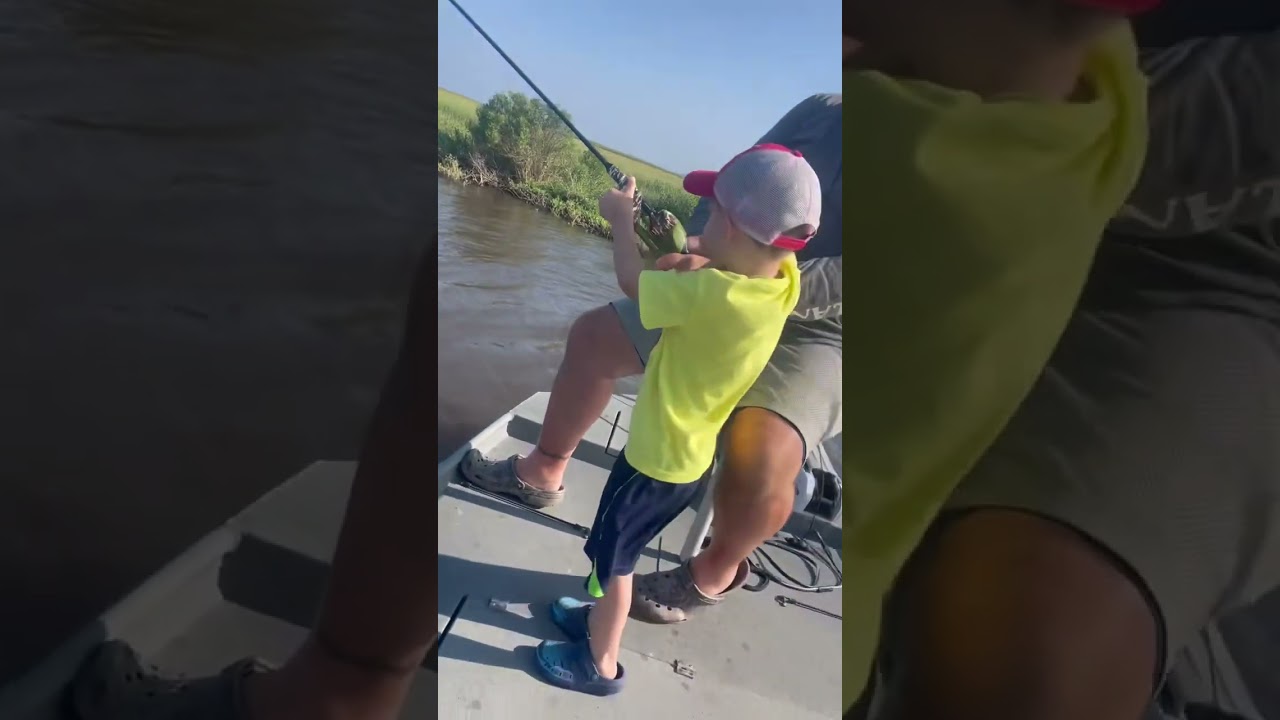 Baby Boy caught his first redfish ever on his brand new camo fishing pole. #redfish #makingmemories