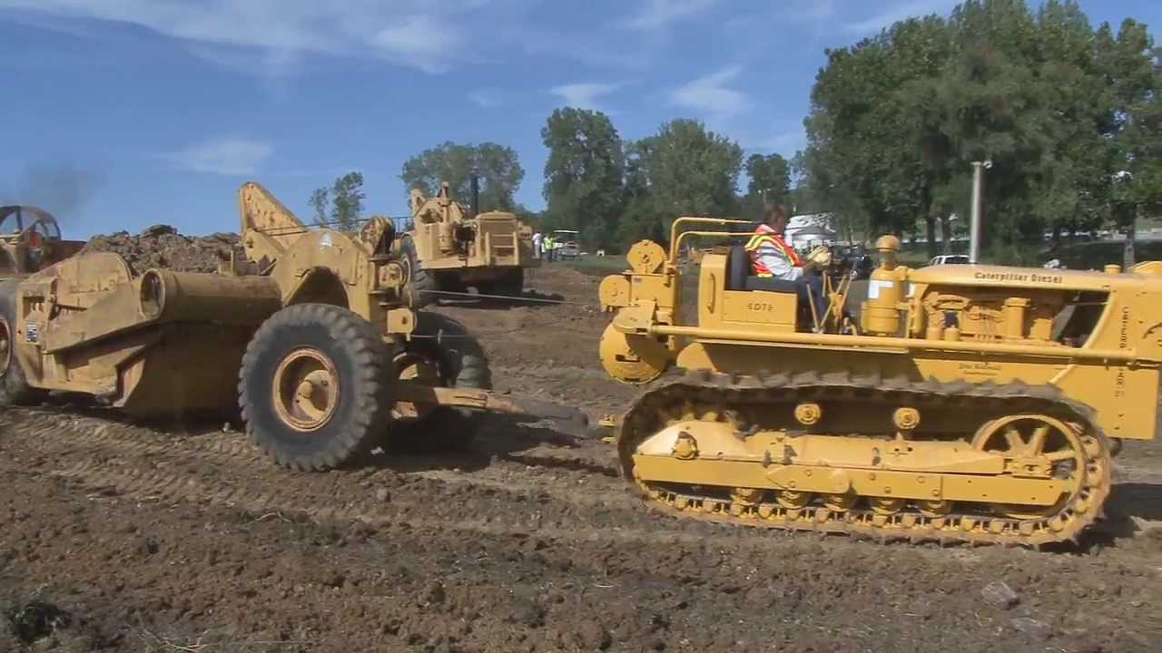 Hard at work at the Threshing Bee. Caterpillar Dozers in action in McLouth Ks 2013