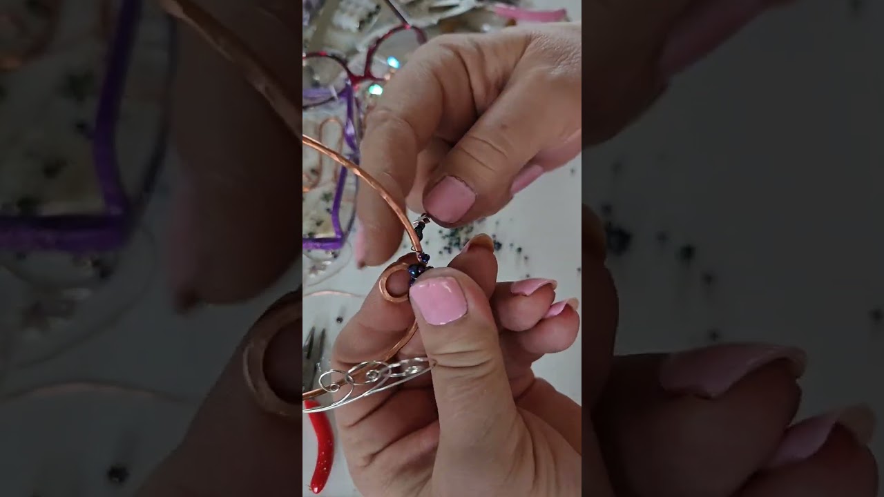 Wire wrapping a sun catcher with an agate.