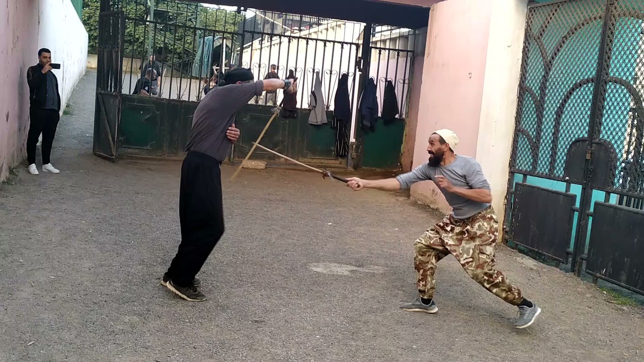 الرياضة العصا التقليدية  شيخ محمد بودينار ع تلميذه الله يبارك