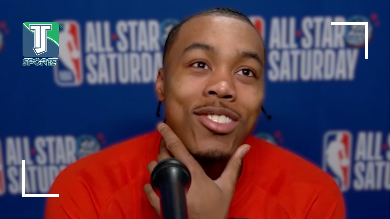 Scottie Barnes reacts to Damian Lillard's victory in the three-point contest