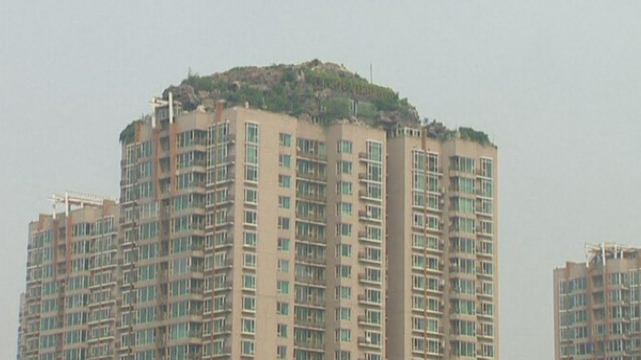 China: Villa built on top of a 26-storey apartment building is demolished