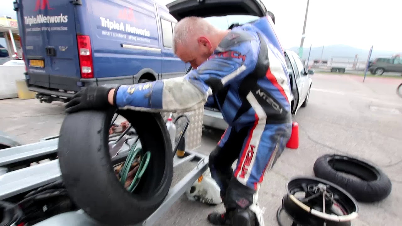 How to manually change a tyre  on a racing track