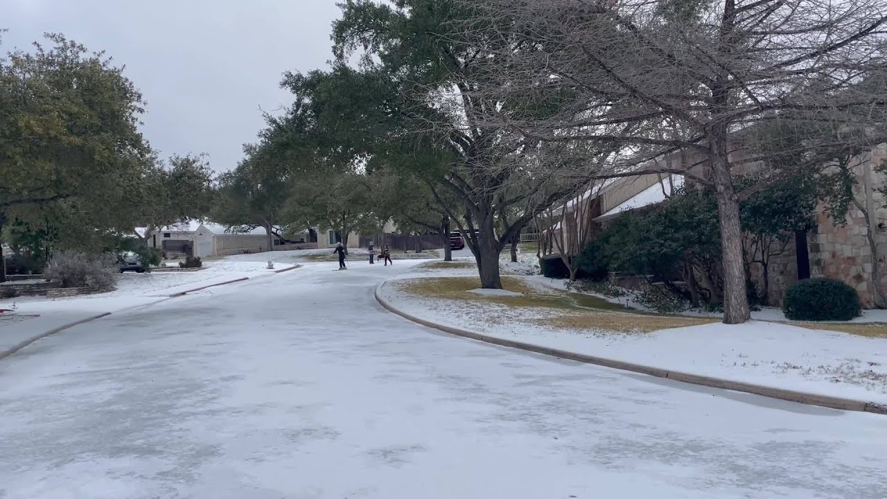 Skiing down an Austin street