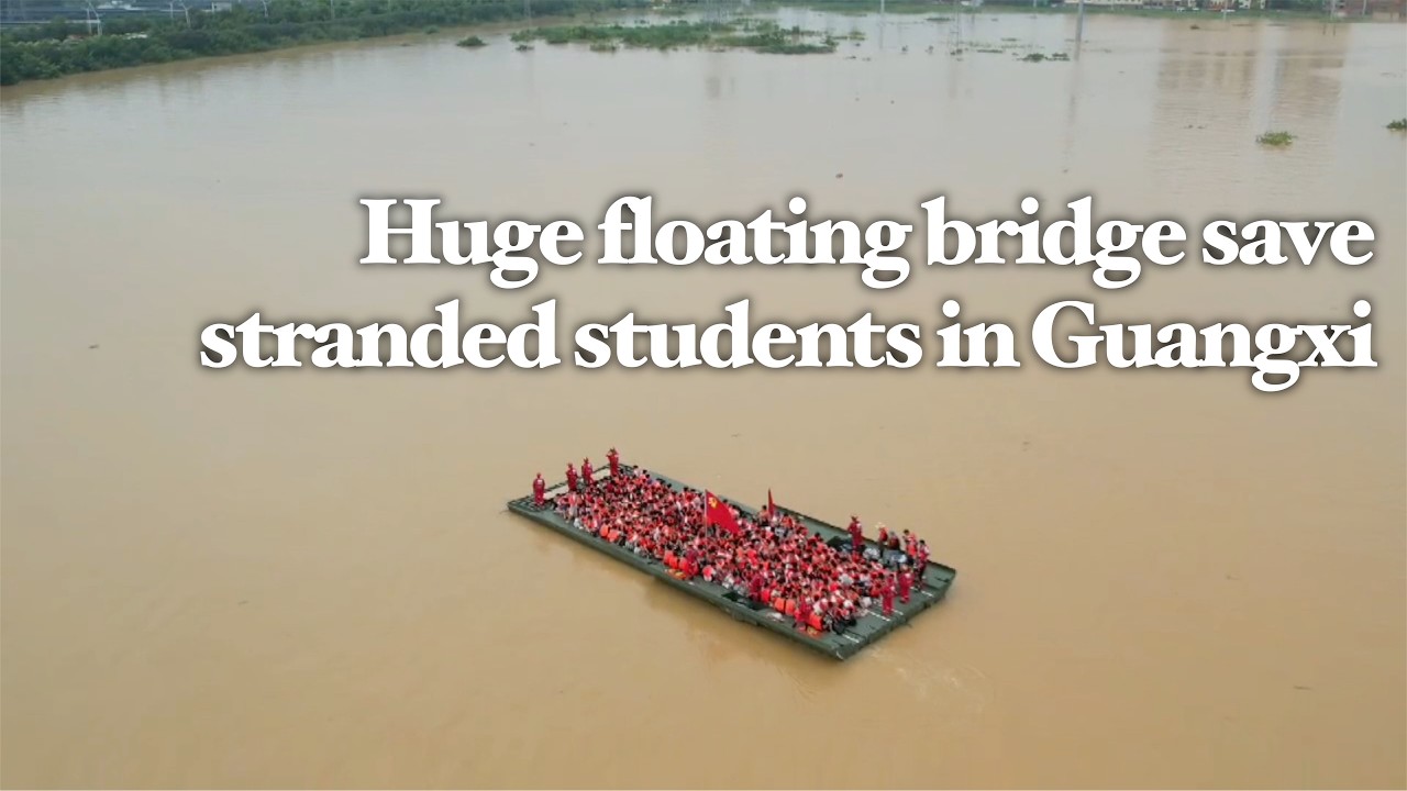 Students cheer as China's 60-meter floating bridge rescues thousands from flooded campus in Guangxi