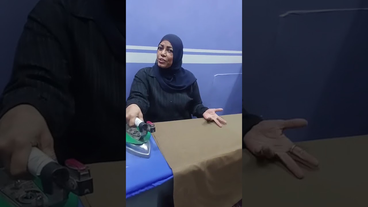«أم محمد» تكسر القيود وتعمل مكوجي في أسيوط: «لازم أكافح علشان أربي عيالي بالحلال»