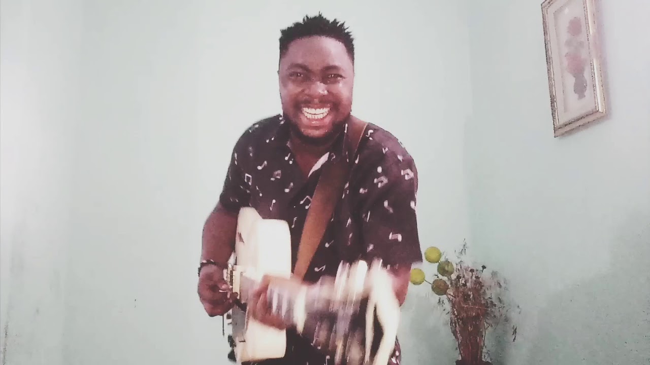 Praise and worship section with Sammy Guitar (men's choir)