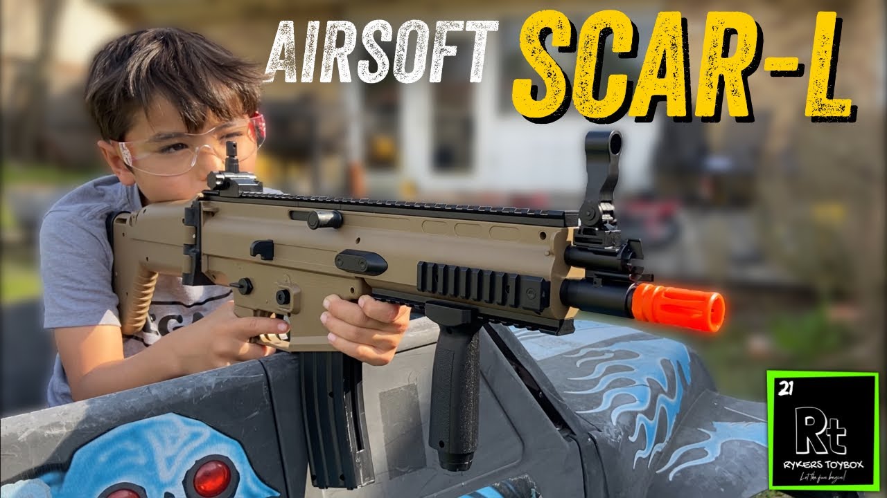 Распаковка и обзор страйкбольного оружия FN Scar, а также распродажа.