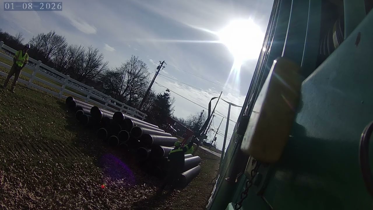 Putting Pipe Down on a busy road. 