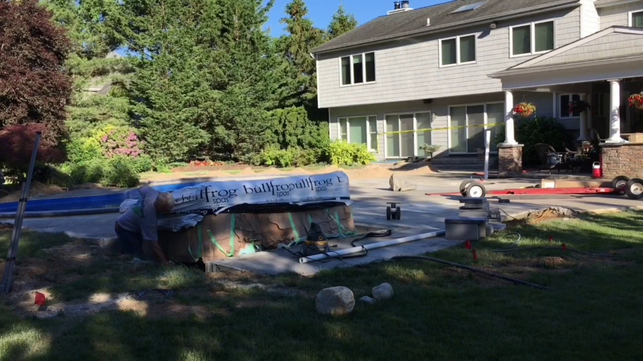 How to install a hot tub into the ground using a spa vault