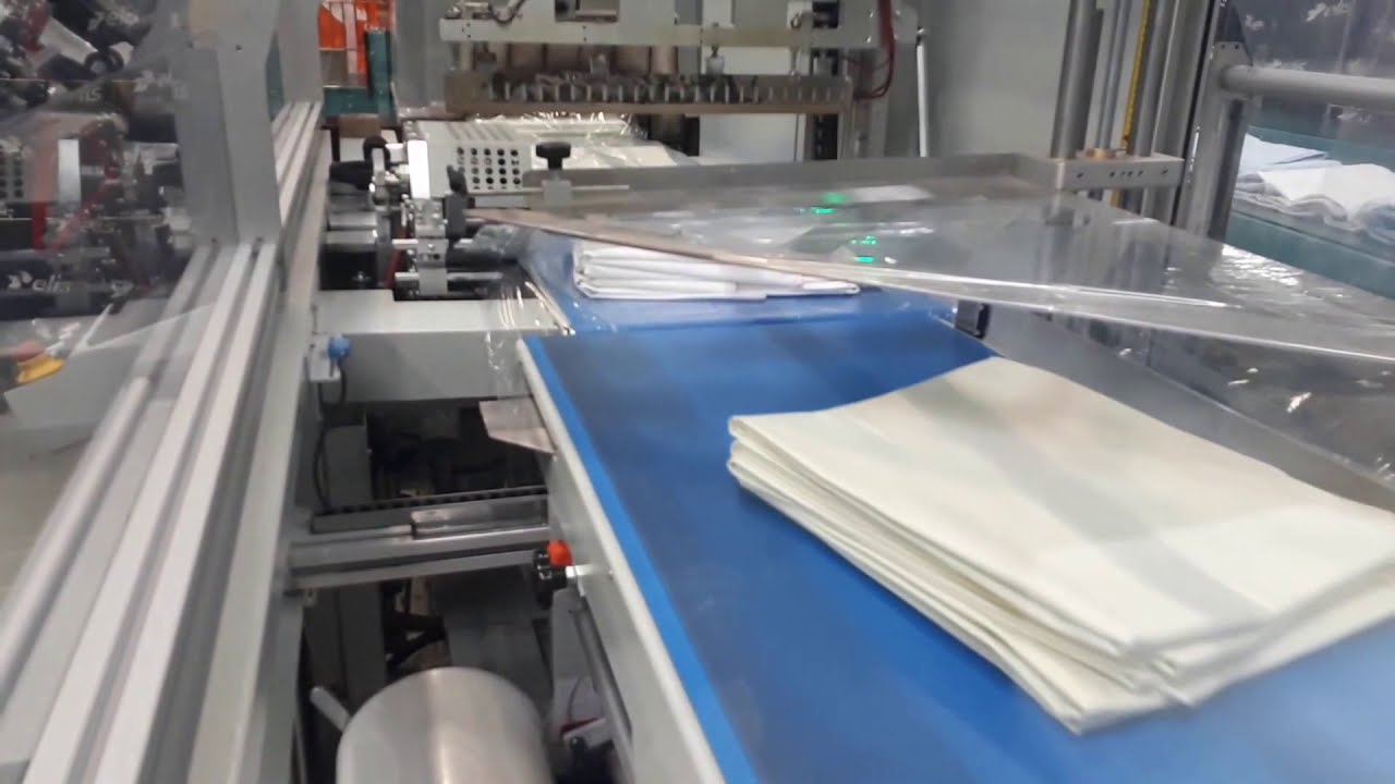 Maripak USA - IMPACK Pro Hybrid - Laundry Shrink Packaging into Bundles