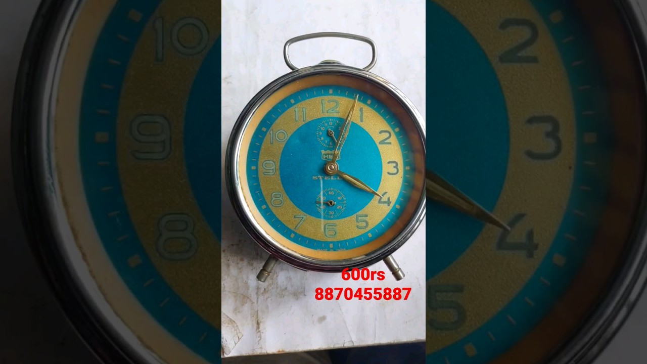 SOLD--HES STELLA Winding Alarm Clock