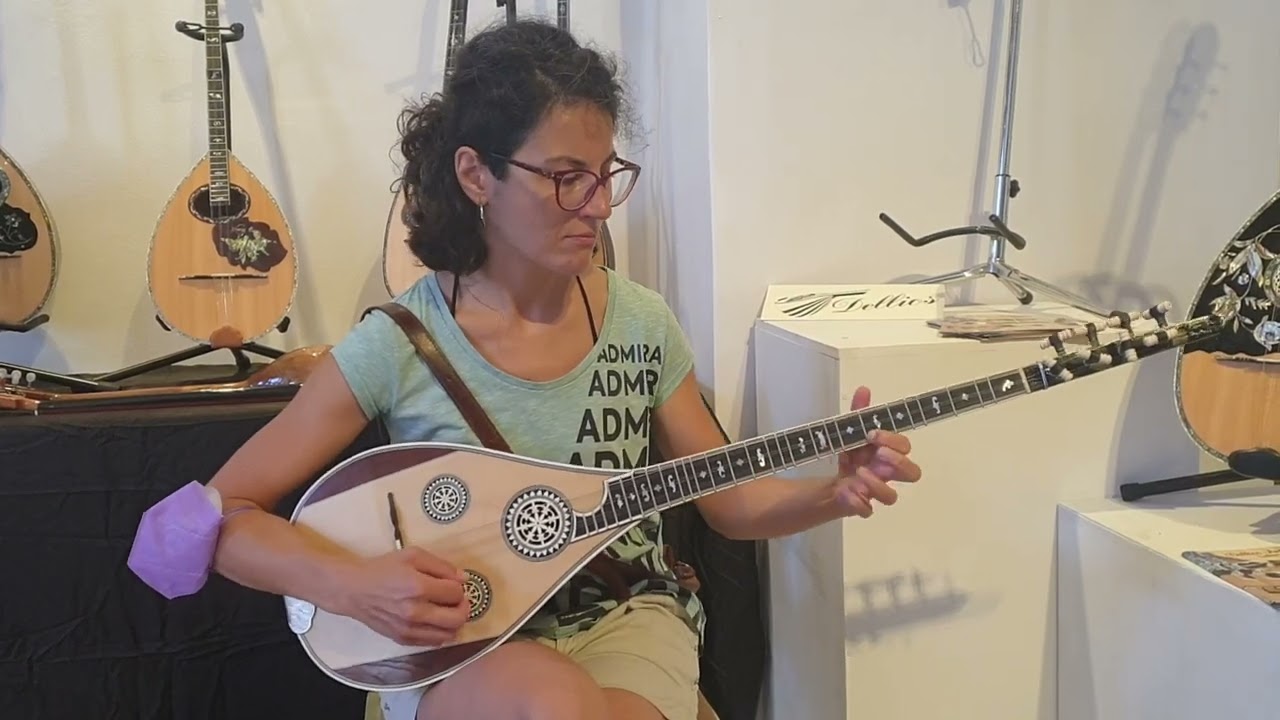 The replica of tamboura - bouzouki of Iovan Tsaous handmade by Andreas Dellios plays Maria Ploumi