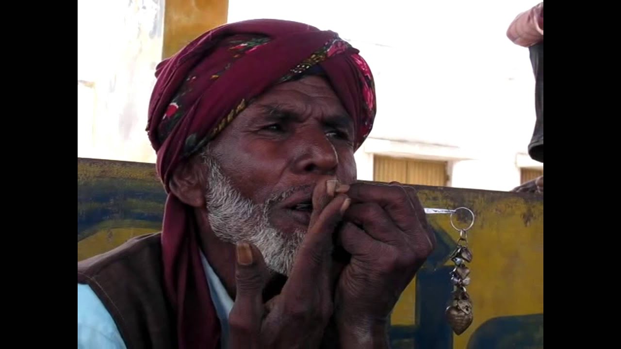 Mr PATHAN sings and play morchang in same time.
