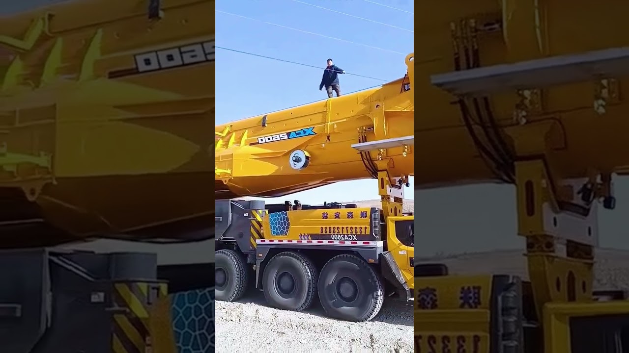 Heavy Machinery on Site: Crane & Excavator Working Together