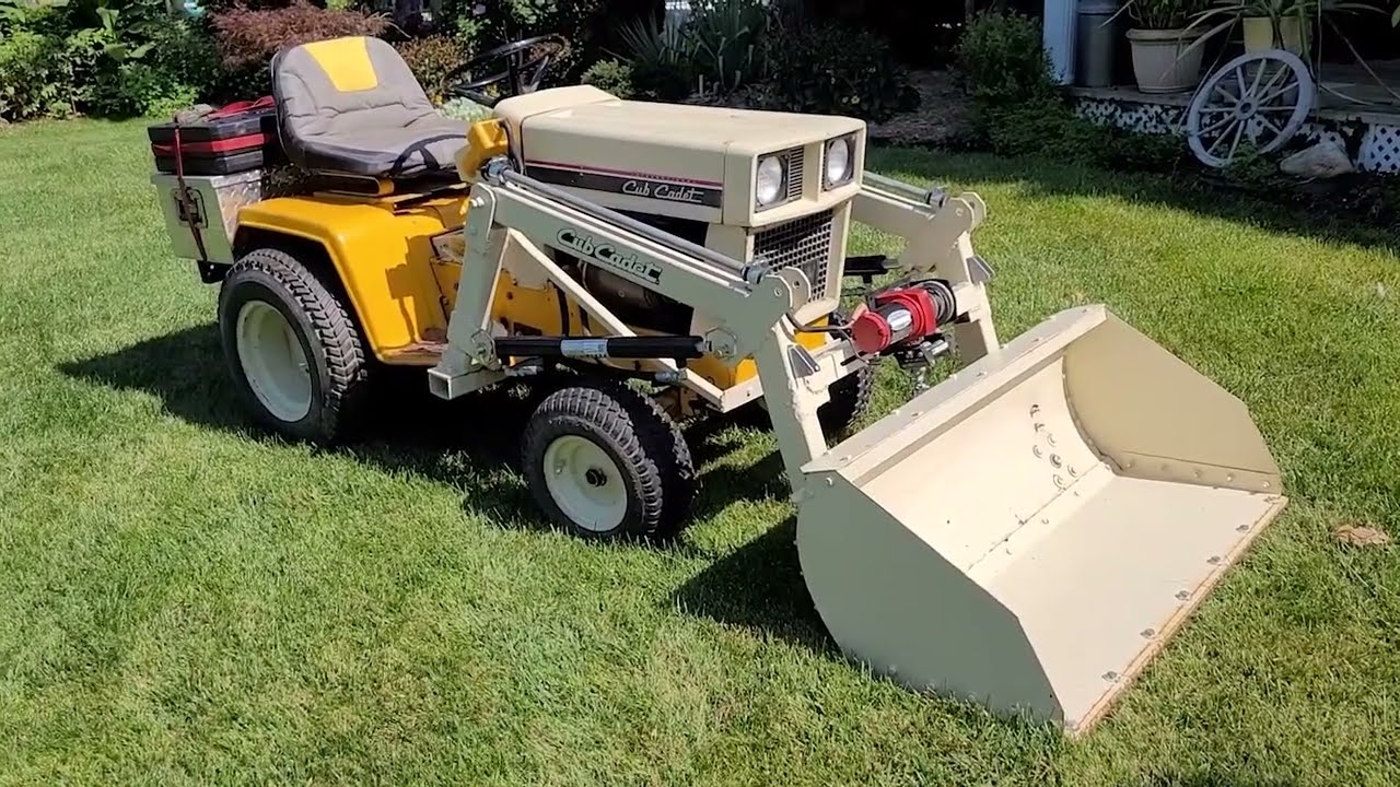 CUB CADET 129 WITH HOMEMADE FRONT END LOADER
