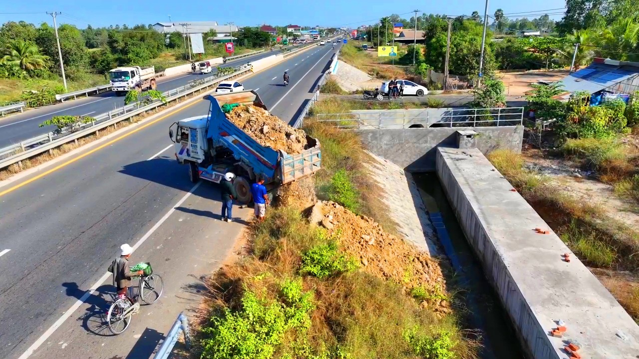 Another day, another load. Strengthening the roadside one dump at a time.
