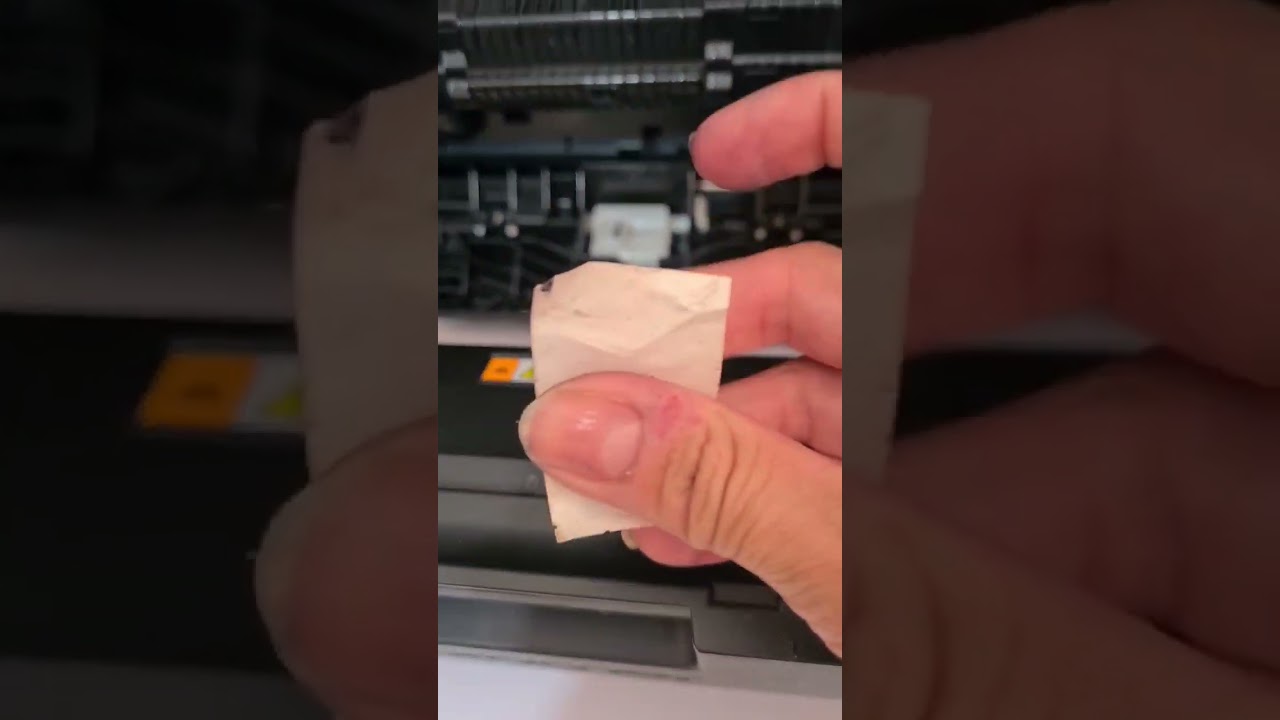 Como remover papel preso dentro da impressora