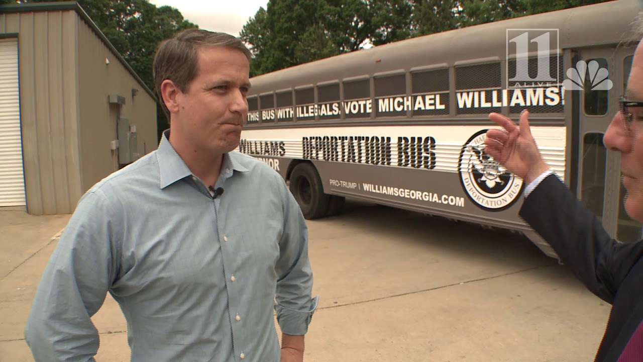 Michael Williams' handler drops f-bomb in response to reporter question about deportation bus