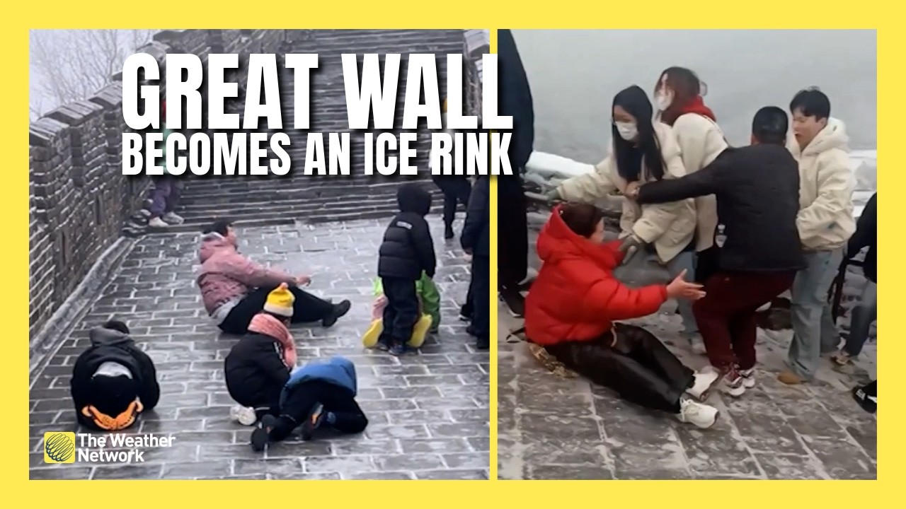 Посетители с трудом держатся на ногах, когда Великая Китайская стена превращается в гигантскую ле...