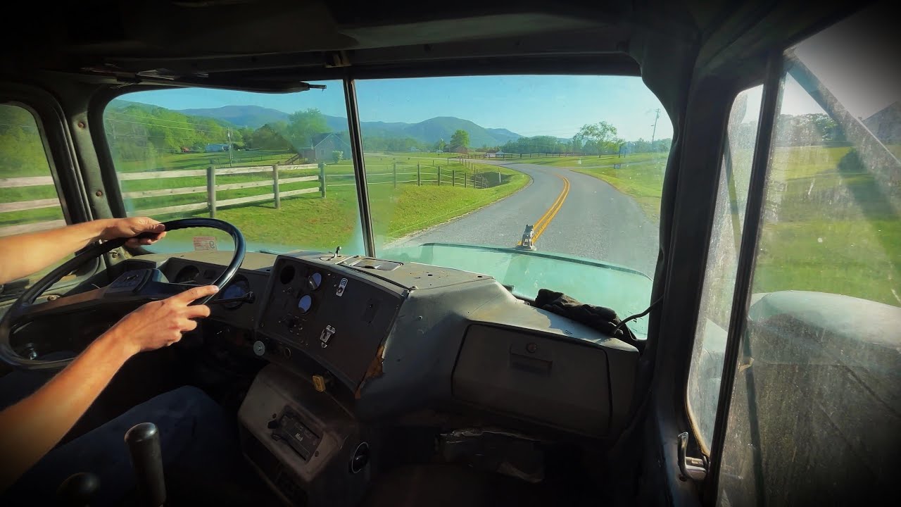 DM Mack Log Truck Hauling Logs