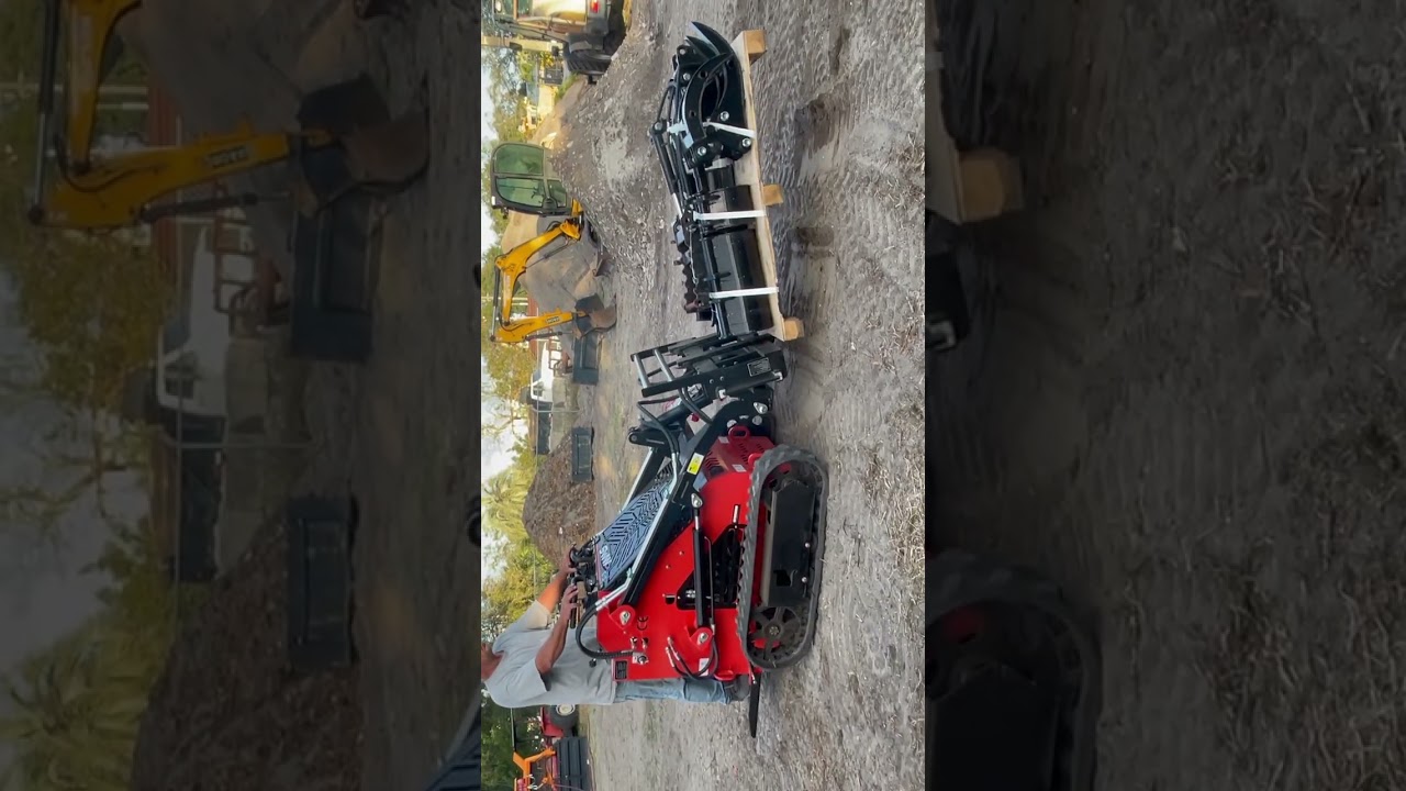 Mini skid steer unloading trailer 